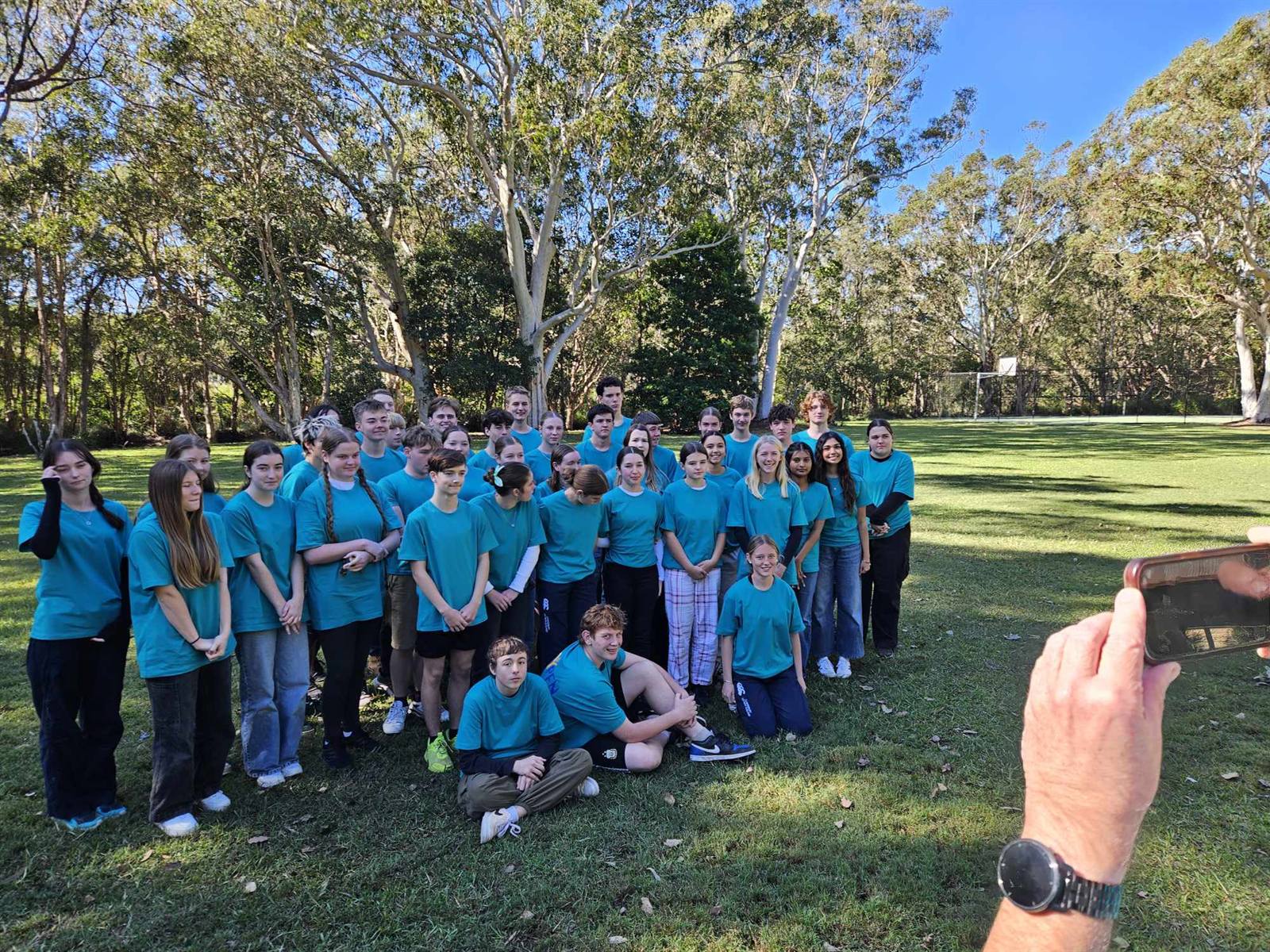 A RYPEN camp group together outdoors in the bush