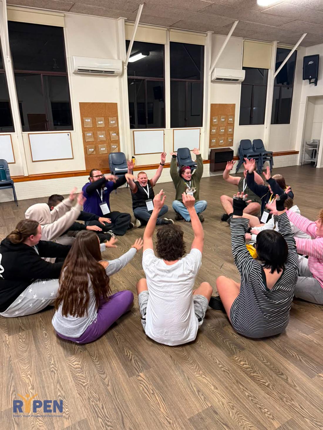 Participants sitting in a circle during a session