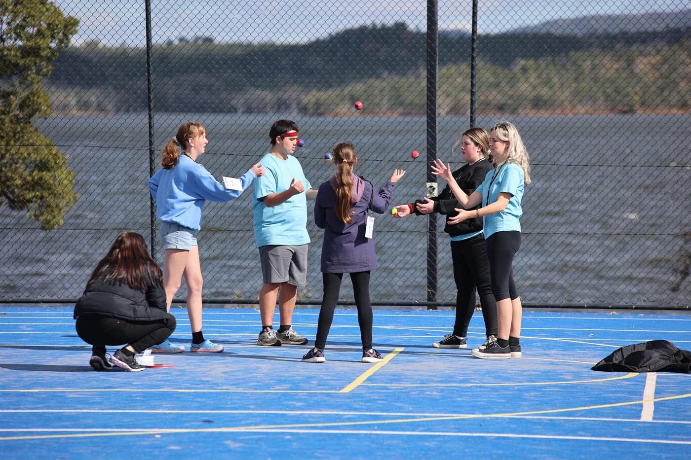 A team game running on the outdoor court