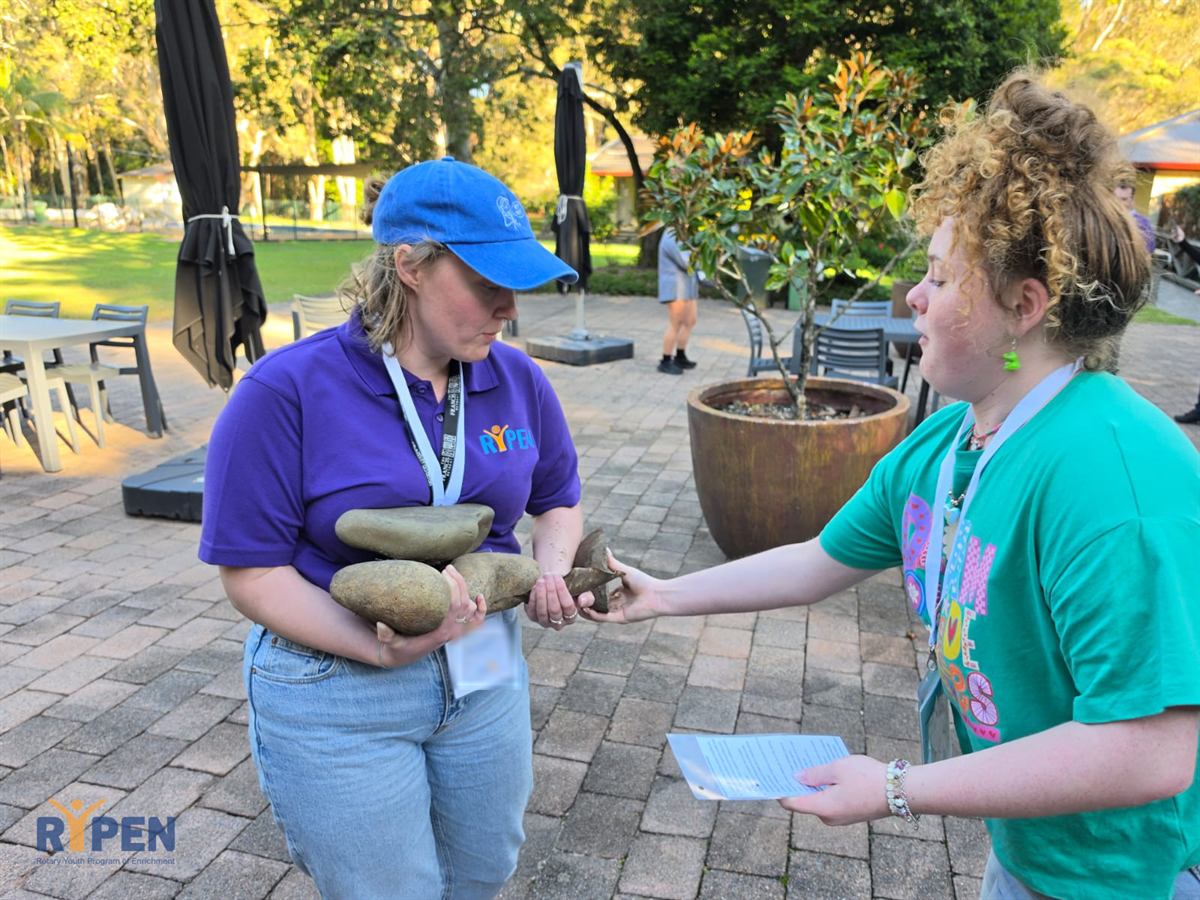 A RYPEN leader running an activity with a participant
